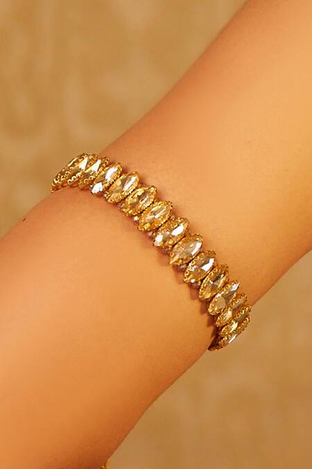 Shop Tarun Tahiliani Gold Plated Stone Crystal Embellished Bajubandh at Aza Fashions Shop_Tarun Tahiliani_Gold Plated Stone Crystal Embellished Bajubandh_at_Aza_Fashions