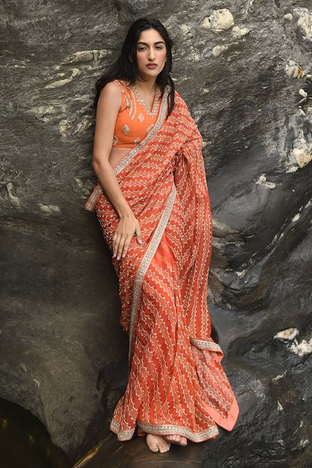 Paulmi and Harsh Orange Organza Printed Leheriya Motifs V Neck Saree With Blouse 