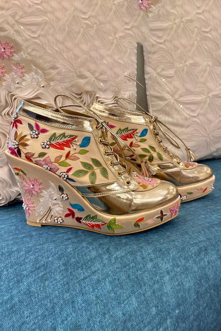 Shop Tiesta Gold Embroidered Sneaker Wedges at Aza Fashions Shop_Tiesta_Gold Embroidered Sneaker Wedges _at_Aza_Fashions