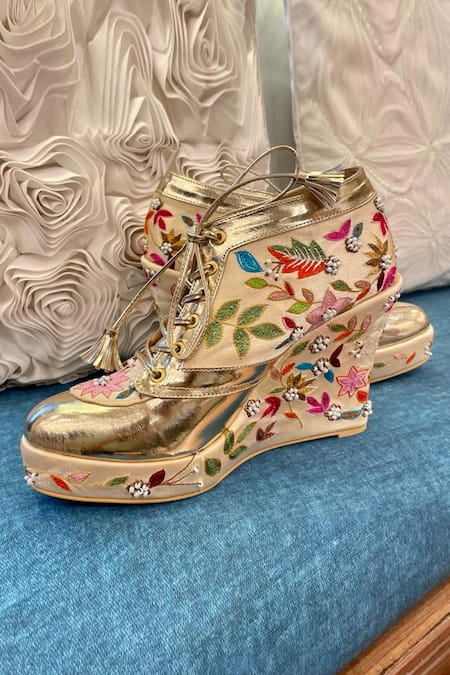Buy Tiesta Gold Embroidered Sneaker Wedges Online at Aza Fashions Buy_Tiesta_Gold Embroidered Sneaker Wedges _Online_at_Aza_Fashions