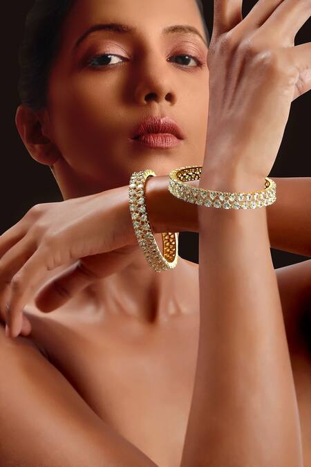 Shop Tizora Gold Plated Fabric Flowers Embellished Bangles - Set Of 2 at Aza Fashions Shop_Tizora_Gold Plated Fabric Flowers Embellished Bangles - Set Of 2 _at_Aza_Fashions