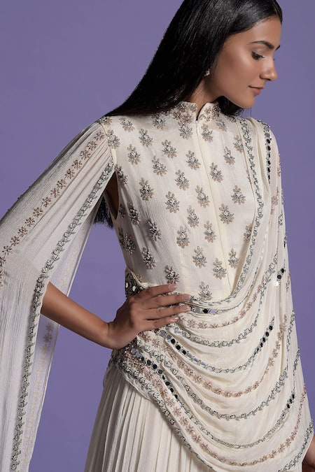 Buy Two Sisters By Gyans Ivory Viscose Floral Mandarin Collar Embroidered Drape Gown Online at Aza Fashions Buy_Two Sisters By Gyans_Ivory Viscose Floral Mandarin Collar Embroidered Drape Gown _Online_at_Aza_Fashions