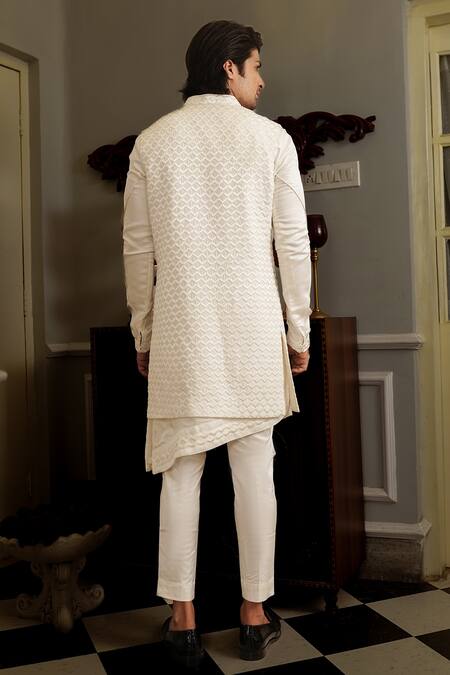 Shop Yajy By Aditya Jain White Kurta And Bundi Silk, Pants Stretch Cotton Thread Dhwaja & Set at Aza Fashions Shop_Yajy By Aditya Jain_White Kurta And Bundi Silk, Pants Stretch Cotton Thread Dhwaja & Set _at_Aza_Fashions