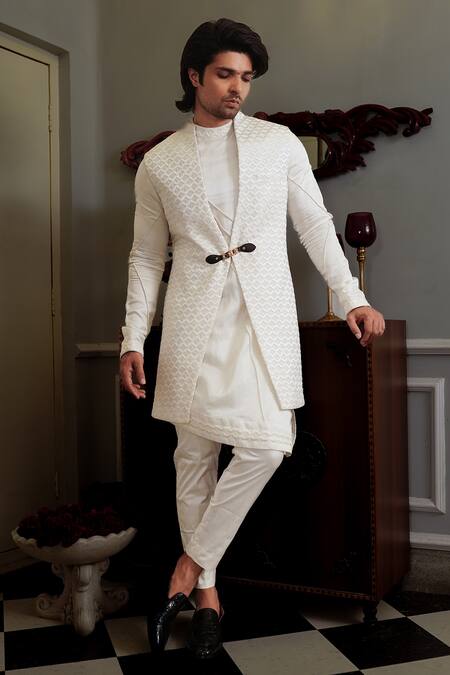 Yajy By Aditya Jain White Kurta And Bundi Silk, Pants Stretch Cotton Thread Dhwaja & Set at Aza Fashions Yajy By Aditya Jain_White Kurta And Bundi Silk, Pants Stretch Cotton Thread Dhwaja & Set _at_Aza_Fashions