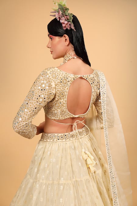 Kafoori ivory Banarasi cotton silk lehenga with peplum blouse and tiss