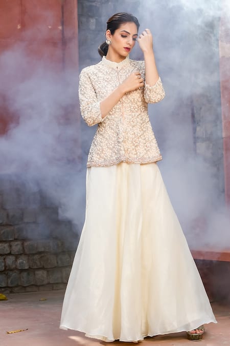 Shop Akanksha Mago Ivory Organza, Net, Shantoon Lining Crystal, Amina Peplum Top And Sharara Set at Aza Fashions Shop_Akanksha Mago_Ivory Organza, Net, Shantoon Lining Crystal, Amina Peplum Top And Sharara Set _at_Aza_Fashions