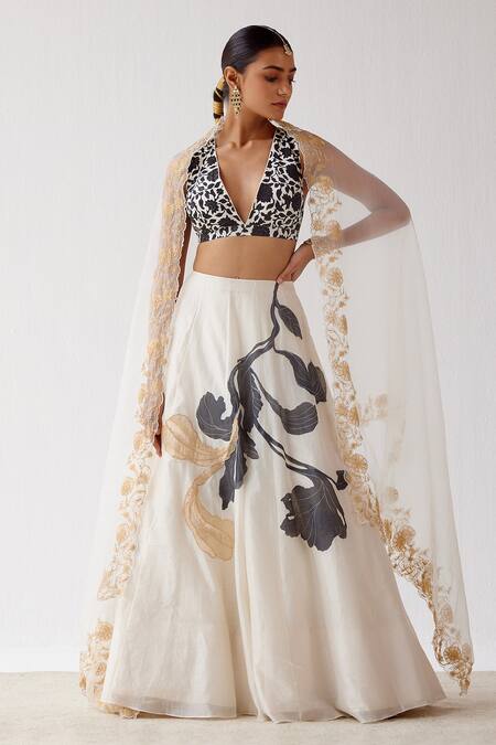 Buy_Devnaagri_Ivory Chanderi, Cotton Silk And Organza Floral Plunge V Hand Painted Lehenga Set _Online_at_Aza_Fashions