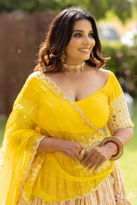 Shop Anjana Bohra Beige Raw Silk, Gajji Silk, Organza Surajmukhi Bandhani Pattern Lehenga Set Online at Aza Fashions Shop_Anjana Bohra_Beige Raw Silk, Gajji Silk, Organza Surajmukhi Bandhani Pattern Lehenga Set_Online_at_Aza_Fashions