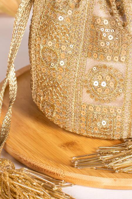 Buy Amyra Gold Embroidery Bella Potli Bag Online at Aza Fashions Buy_Amyra_Gold Embroidery Bella Potli Bag _Online_at_Aza_Fashions