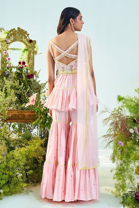 Shop Mani Bhatia Pink Net, Lining Shantoon, Pure Chanderi Silk Eliza Peplum Top And Gharara Set at Aza Fashions Shop_Mani Bhatia_Pink Net, Lining Shantoon, Pure Chanderi Silk Eliza Peplum Top And Gharara Set _at_Aza_Fashions