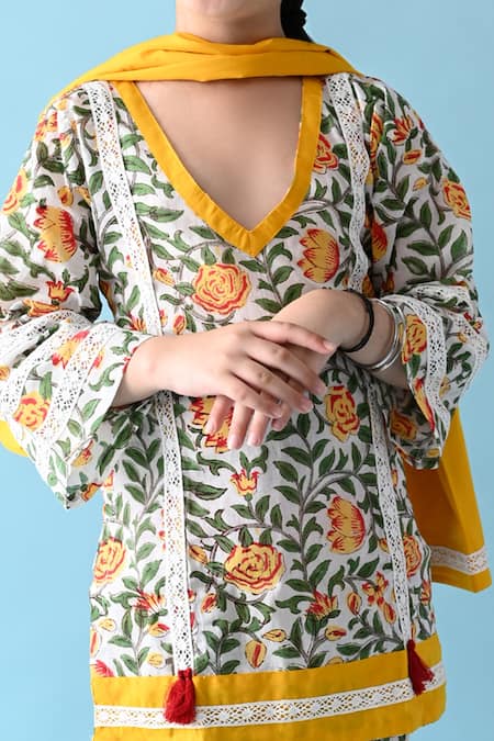 THE COTTON STAPLE_Yellow Cotton Tassels Uzma Floral Print Kurta Set _at_Aza_Fashions