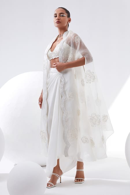 Tisha Saksena_Ivory Bralette Raw Silk, Cape Organza, Drape Skirt Dupion, Camellia And Set _Online_at_Aza_Fashions