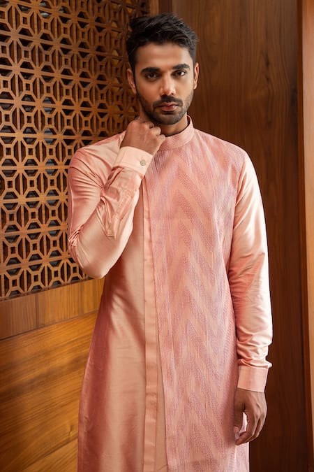 Shop Darshika Menswear Peach Cotton Silk Pintucks Asymmetric Kurta Set at Aza Fashions Shop_Darshika Menswear_Peach Cotton Silk Pintucks Asymmetric Kurta Set _at_Aza_Fashions