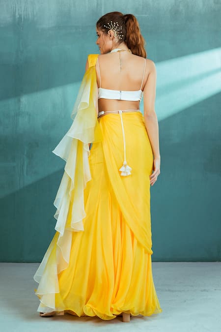 Mandira Wirk - Indian Yellow Chiffon Pearls Sweetheart Neck Pre-draped Ruffle Saree With Bustier Online at Aza Fashions Mandira Wirk - Indian_Yellow Chiffon Pearls Sweetheart Neck Pre-draped Ruffle Saree With Bustier _Online_at_Aza_Fashions