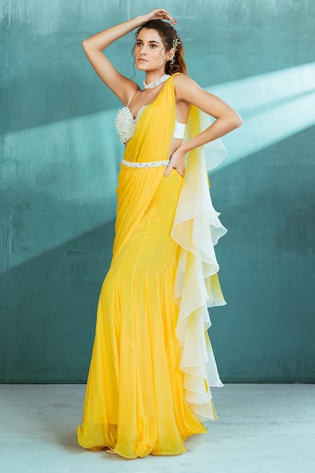 Shop Mandira Wirk - Indian Yellow Chiffon Pearls Sweetheart Neck Pre-draped Ruffle Saree With Bustier Online at Aza Fashions Shop_Mandira Wirk - Indian_Yellow Chiffon Pearls Sweetheart Neck Pre-draped Ruffle Saree With Bustier _Online_at_Aza_Fashions