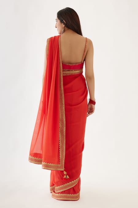 Shop_Nikasha_Coral 100% Viscose Georgette, Pure Raw Silk Gota V Embroidered Saree With Blouse _at_Aza_Fashions