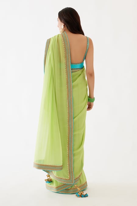 Shop Nikasha Blue 100% Viscose Georgette, Pure Raw Silk Gota V Embroidered Saree With Blouse at Aza Fashions Shop_Nikasha_Blue 100% Viscose Georgette, Pure Raw Silk Gota V Embroidered Saree With Blouse _at_Aza_Fashions