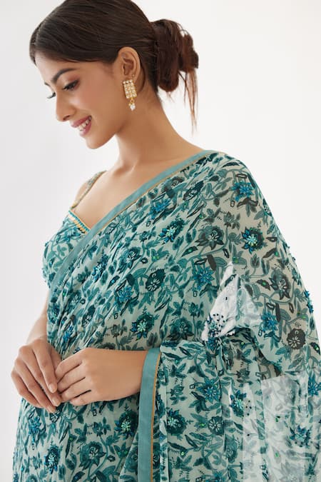Shop Nikasha Green 100% Viscose Georgette Cutdana, Floral, Resham, Print Saree With Blouse Online at Aza Fashions Shop_Nikasha_Green 100% Viscose Georgette Cutdana, Floral, Resham, Print Saree With Blouse _Online_at_Aza_Fashions