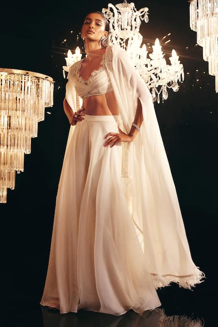 Ridhi Mehra_Ivory Blouse Net Embroidery 3d Cajsa Asymmetric Cape And Sharara Set  _Online_at_Aza_Fashions