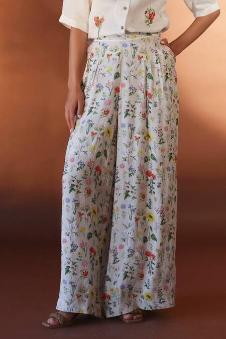 Shop POZRUH White Hemp And Bamboo Blend Floral Luna Print Flared Pant Online at Aza Fashions Shop_POZRUH_White Hemp And Bamboo Blend Floral Luna Print Flared Pant_Online_at_Aza_Fashions