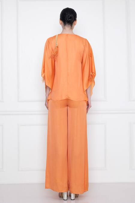 Shop Dilnaz Orange Cotton Satin Plunge V Neck Jumpsuit at Aza Fashions Shop_Dilnaz_Orange Cotton Satin Plunge V Neck Jumpsuit_at_Aza_Fashions
