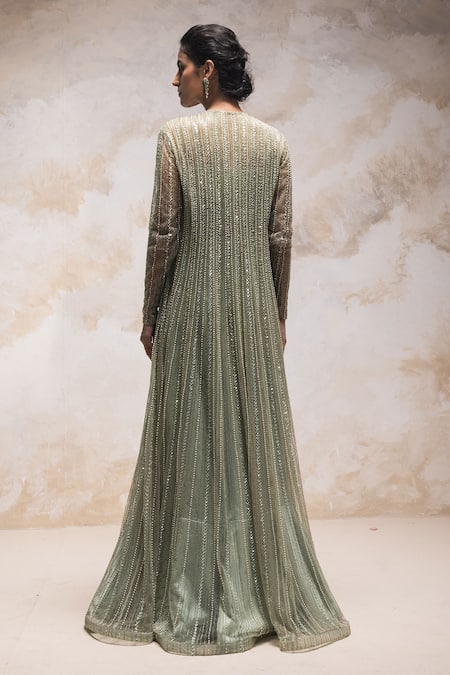 Shop COUTURE BY NIHARIKA Green Net And Pure Satin Bugle Beads, Pearls Embroidered Jacket & Ruffle Skirt Set at Aza Fashions Shop_COUTURE BY NIHARIKA_Green Net And Pure Satin Bugle Beads, Pearls Embroidered Jacket & Ruffle Skirt Set _at_Aza_Fashions