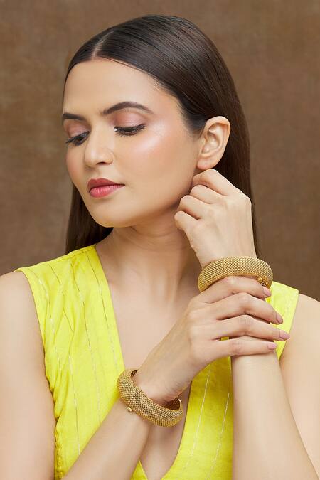Saga Jewels_Gold Plated Cutwork Detail Bangle - Set Of 2_at_Aza_Fashions