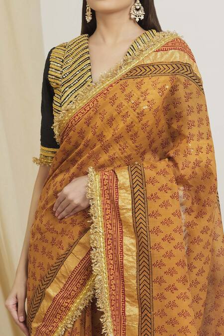 Shop Surendri Orange Raw Silk, Kotadoria Floral V Neck Hand Block Print Saree With Blouse Online at Aza Fashions Shop_Surendri_Orange Raw Silk, Kotadoria Floral V Neck Hand Block Print Saree With Blouse_Online_at_Aza_Fashions
