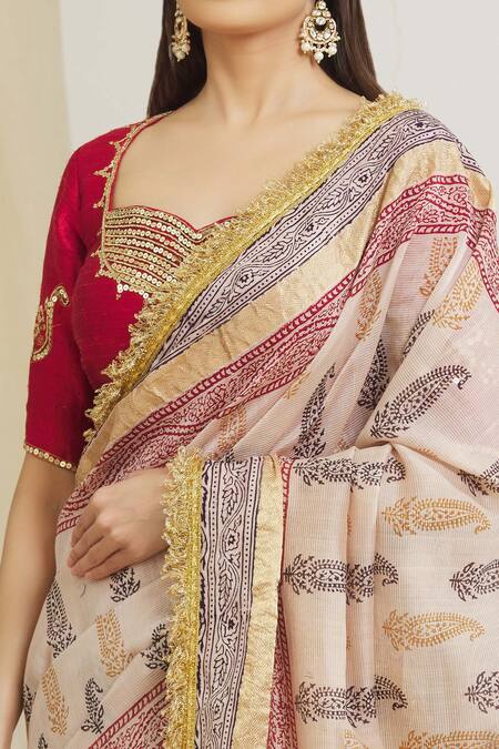 Shop_Surendri_Ivory Raw Silk, Kotadoria Floral Sweetheart Saree With Back Tassel Tie-up Blouse_Online_at_Aza_Fashions