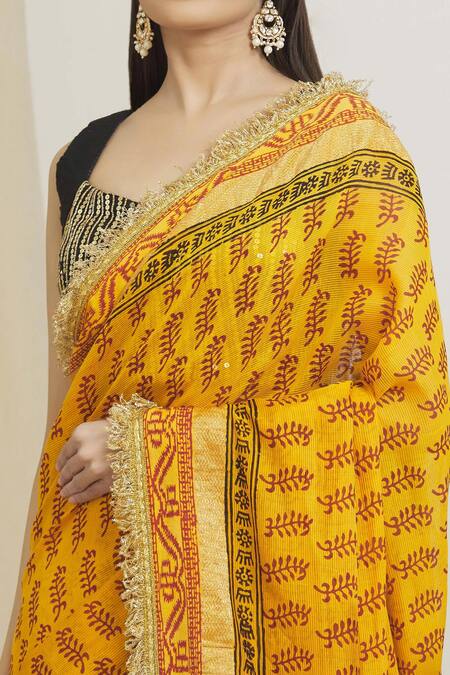 Shop_Surendri_Orange Raw Silk, Kotadoria Floral Plunge V Woven Saree With Embroidered Blouse_Online_at_Aza_Fashions