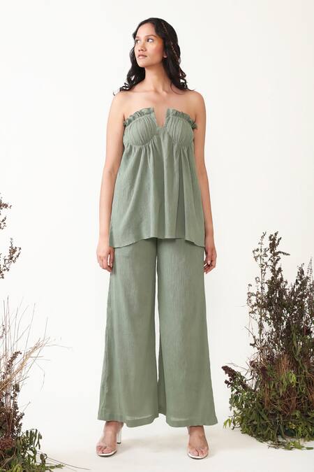 Shop Chambray & CO. Green Cotton Ruffles Off-shoulder Olive Ruched Top And High Waisted Pant Set Online at Aza Fashions Shop_Chambray & CO._Green Cotton Ruffles Off-shoulder Olive Ruched Top And High Waisted Pant Set _Online_at_Aza_Fashions