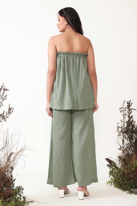 Shop Chambray & CO. Green Cotton Bandeau Neck Petra Solid Tube Top And Flared Pant Set at Aza Fashions Shop_Chambray & CO._Green Cotton Bandeau Neck Petra Solid Tube Top And Flared Pant Set _at_Aza_Fashions