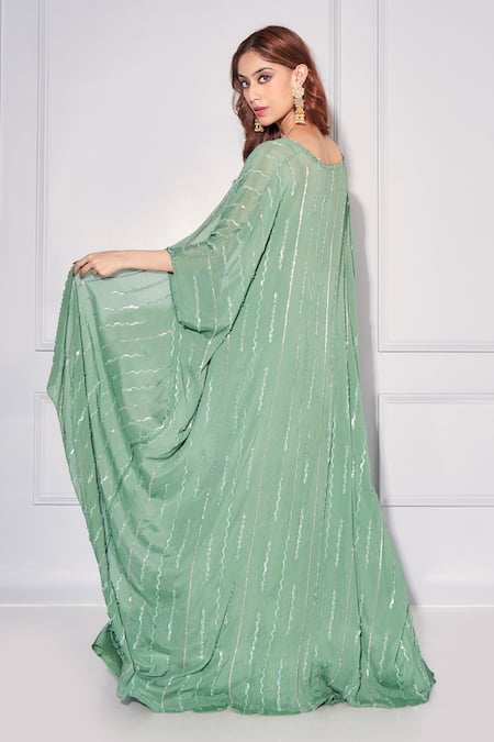 Shop Kressa Green Silk, Crepe Sequins Sweetheart Neck Embellished Cape Sharara Set at Aza Fashions Shop_Kressa_Green Silk, Crepe Sequins Sweetheart Neck Embellished Cape Sharara Set_at_Aza_Fashions