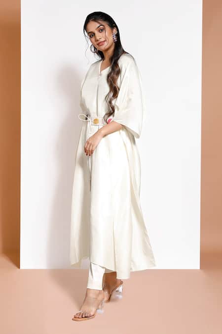 Shop Kressa White Silk, Crepe Embroidery V-neck Geometric Embellished Poncho Set at Aza Fashions Shop_Kressa_White Silk, Crepe Embroidery V-neck Geometric Embellished Poncho Set_at_Aza_Fashions