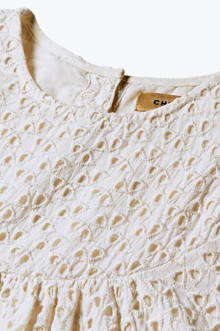 Shop_Charkhee_White Cotton Embroidery Schiffli Pattern Tiered Dress_Online_at_Aza_Fashions