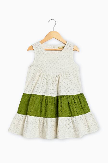 Charkhee_White Cotton Embroidery Schiffli Pattern Tiered Dress_at_Aza_Fashions