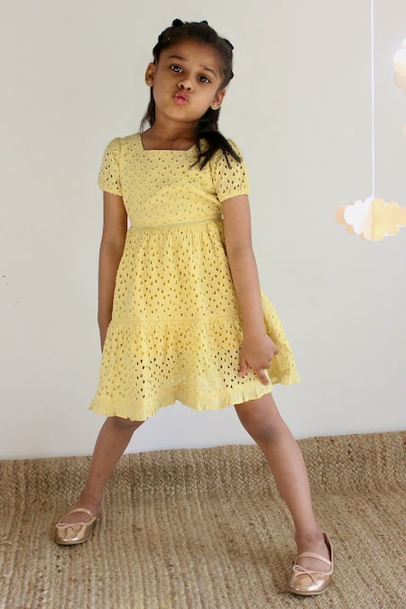 Buy Charkhee Yellow Cotton Embroidery Schiffli Pattern Tiered Dress at Aza Fashions Buy_Charkhee_Yellow Cotton Embroidery Schiffli Pattern Tiered Dress _at_Aza_Fashions