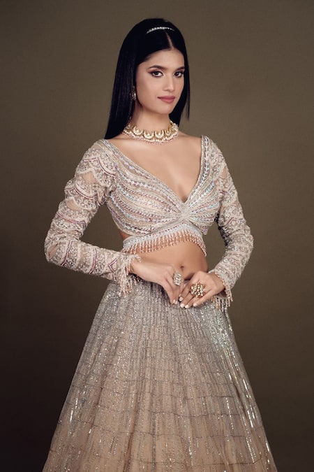 Anjalee And Arjun Kapoor_Beige Net Embroidery, Tassels V-neck Geometric Bridal Lehenga Set _Online_at_Aza_Fashions