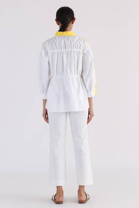 Shop Studio Moda India Yellow Cotton Tassels Shawl Neck Colorblock Shirt at Aza Fashions Shop_Studio Moda India_Yellow Cotton Tassels Shawl Neck Colorblock Shirt _at_Aza_Fashions