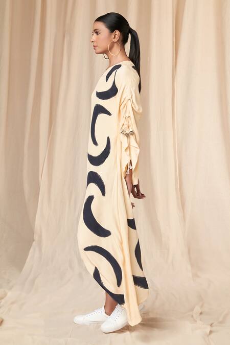 Shop Masaba Ivory Crepe Tassels Asymmetric Mooncrest Print One Shoulder Kaftan Online at Aza Fashions Shop_Masaba_Ivory Crepe Tassels Asymmetric Mooncrest Print One Shoulder Kaftan_Online_at_Aza_Fashions