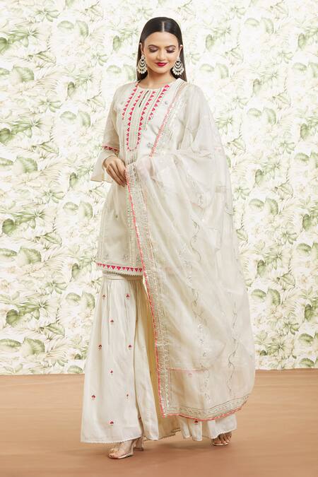 Shop Kaia White Cotton, Organza Sequins, Gota Patti, Embroidery Keyhole Kurta Gharara Set Online at Aza Fashions Shop_Kaia_White Cotton, Organza Sequins, Gota Patti, Embroidery Keyhole Kurta Gharara Set_Online_at_Aza_Fashions