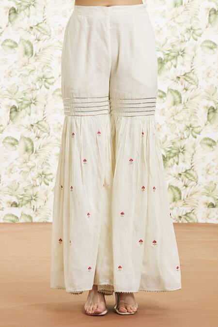 Kaia White Cotton, Organza Sequins, Gota Patti, Embroidery Keyhole Kurta Gharara Set at Aza Fashions Kaia_White Cotton, Organza Sequins, Gota Patti, Embroidery Keyhole Kurta Gharara Set_at_Aza_Fashions