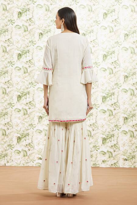 Shop Kaia White Cotton, Organza Sequins, Gota Patti, Embroidery Keyhole Kurta Gharara Set at Aza Fashions Shop_Kaia_White Cotton, Organza Sequins, Gota Patti, Embroidery Keyhole Kurta Gharara Set_at_Aza_Fashions