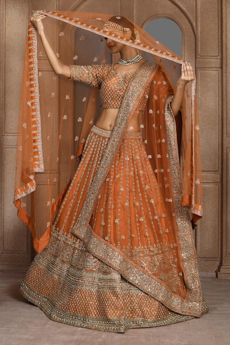 Shop_Kalighata_Orange Silk Sequins, Cut Work Asymmetric Aster Raw Bridal Lehenga Set _Online_at_Aza_Fashions