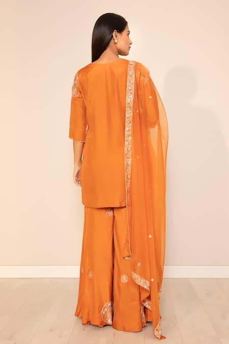 Shop Harshita Jain Orange Silk Organza Sequins, Cut Work, Mirrors Embroidered Kurta Sharara Set at Aza Fashions Shop_Harshita Jain_Orange Silk Organza Sequins, Cut Work, Mirrors Embroidered Kurta Sharara Set _at_Aza_Fashions