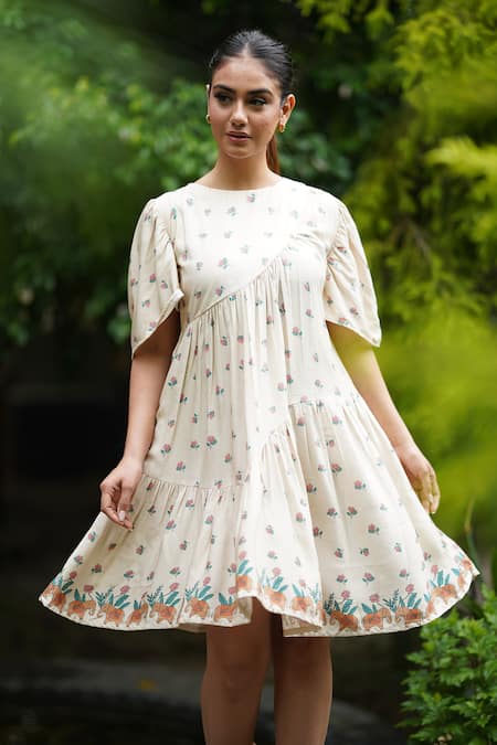 Shop_Leela By A_Beige Tencel Embroidery Round Neck Lotus Print Tiered Dress _at_Aza_Fashions