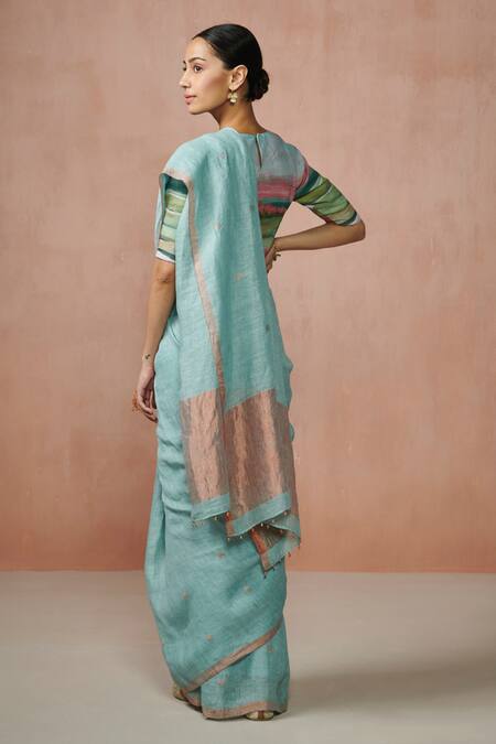Shop Dressfolk Blue Linen, Silk Tassels Handloom Zari Stripe Saree With Running Blouse at Aza Fashions Shop_Dressfolk_Blue Linen, Silk Tassels Handloom Zari Stripe Saree With Running Blouse_at_Aza_Fashions