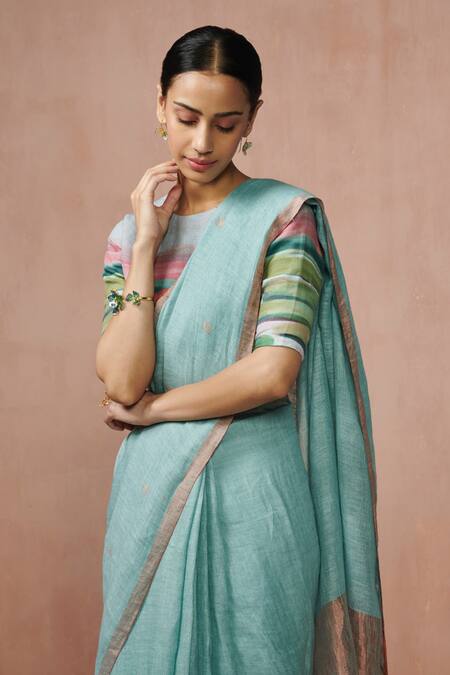 Shop Dressfolk Blue Linen, Silk Tassels Handloom Zari Stripe Saree With Running Blouse Online at Aza Fashions Shop_Dressfolk_Blue Linen, Silk Tassels Handloom Zari Stripe Saree With Running Blouse_Online_at_Aza_Fashions