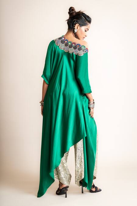 Shop Nupur Kanoi White Silk, Crepe Beads, Sequins, Embroidery One Shoulder Top And Draped Pant Set at Aza Fashions Shop_Nupur Kanoi_White Silk, Crepe Beads, Sequins, Embroidery One Shoulder Top And Draped Pant Set_at_Aza_Fashions