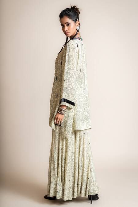 Shop Nupur Kanoi White Crepe Embroidery, Sequins, Beads Floral Pattern Short Kurta And Gharara Set at Aza Fashions Shop_Nupur Kanoi_White Crepe Embroidery, Sequins, Beads Floral Pattern Short Kurta And Gharara Set_at_Aza_Fashions